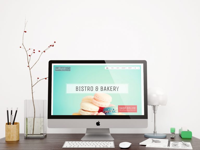 Urban Bistro — bistro website homepage with turquoise and coral panels