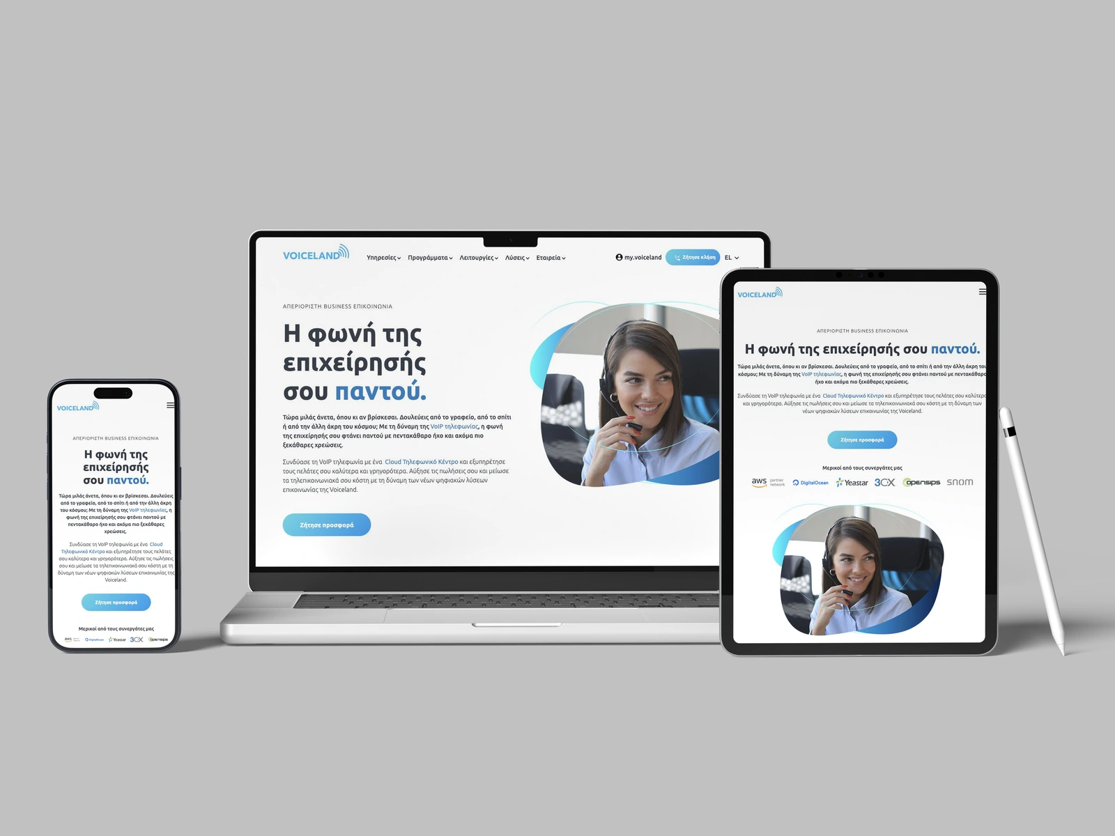 Voiceland homepage on laptop, tablet and smartphone mockups against a grey background