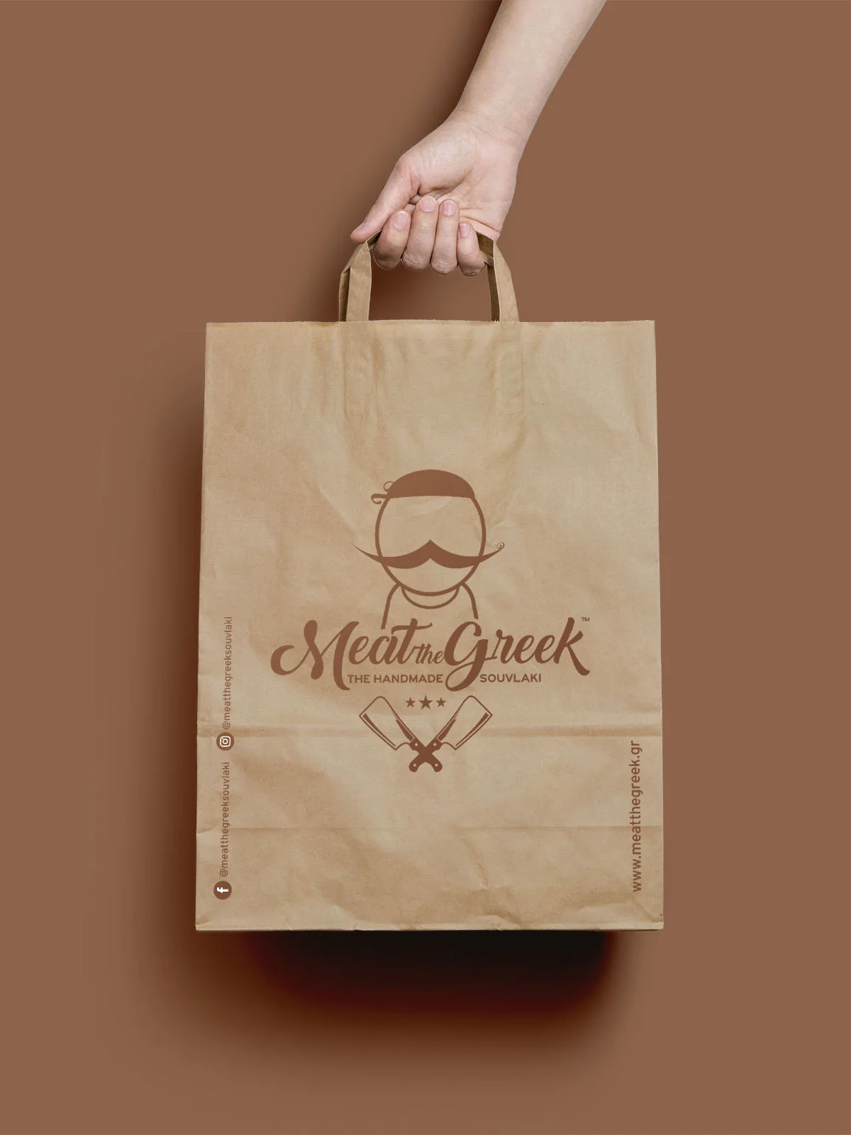 Meat the Greek — kraft takeaway bag with the restaurant identity