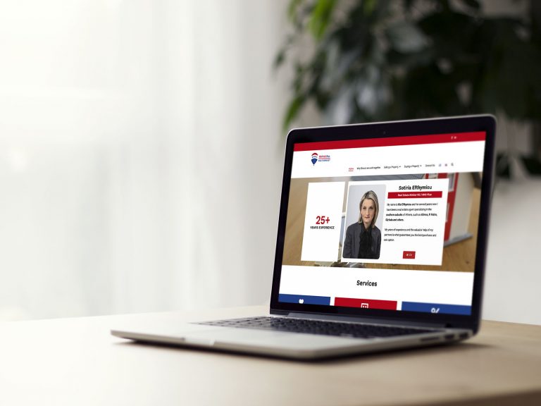 RE/MAX Efthymiou — estate-agency website homepage shown on a laptop