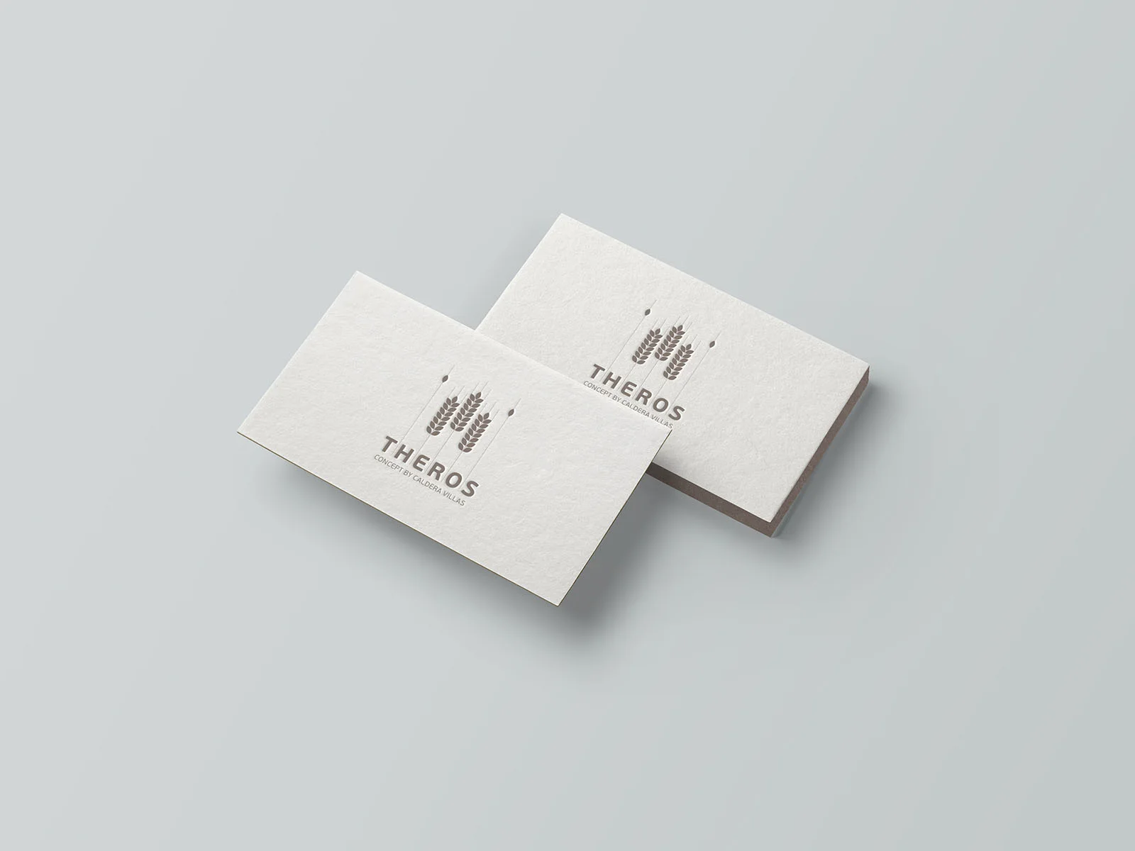 Theros Concept — ivory business cards with a warm grey wheat emblem