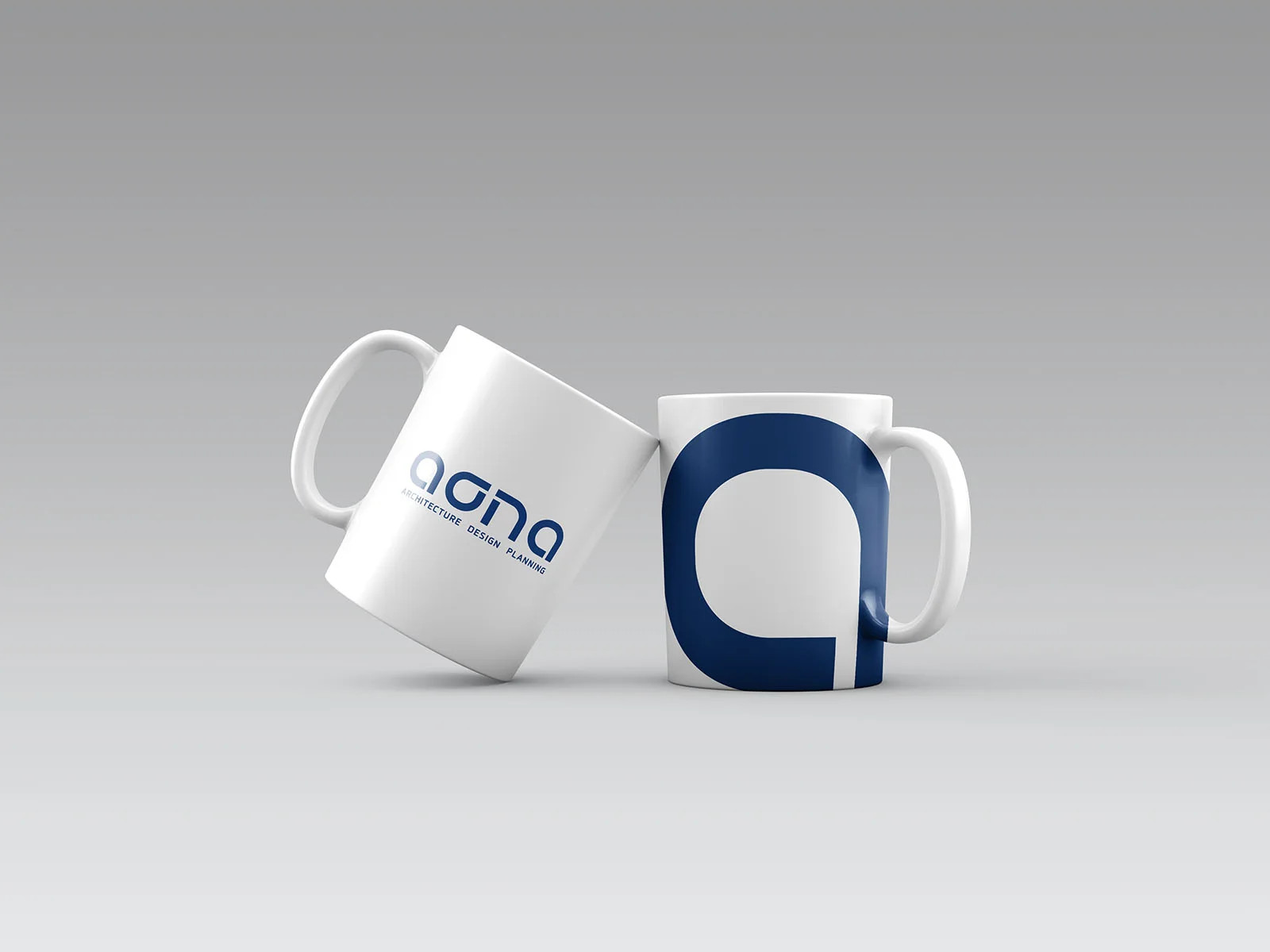 ASPA Design — white mugs with the blue wordmark and enlarged letterform