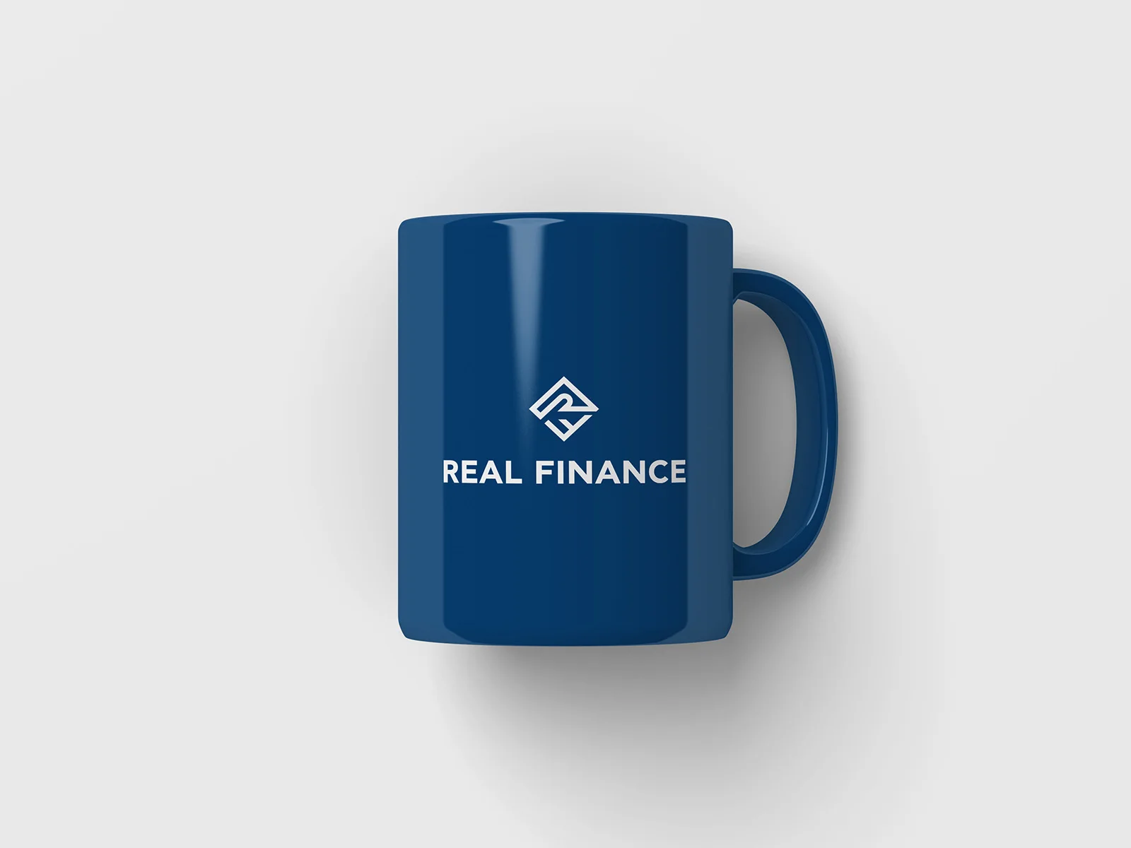 Real Finance — κούπα με την ταυτότητα του brand