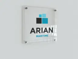 Arian Maritime logo on a clear acrylic sign mockup