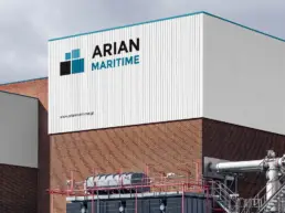 Visualisation of Arian Maritime corporate signage on a building facade