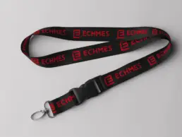 Black ECHMES lanyard with repeating red logo