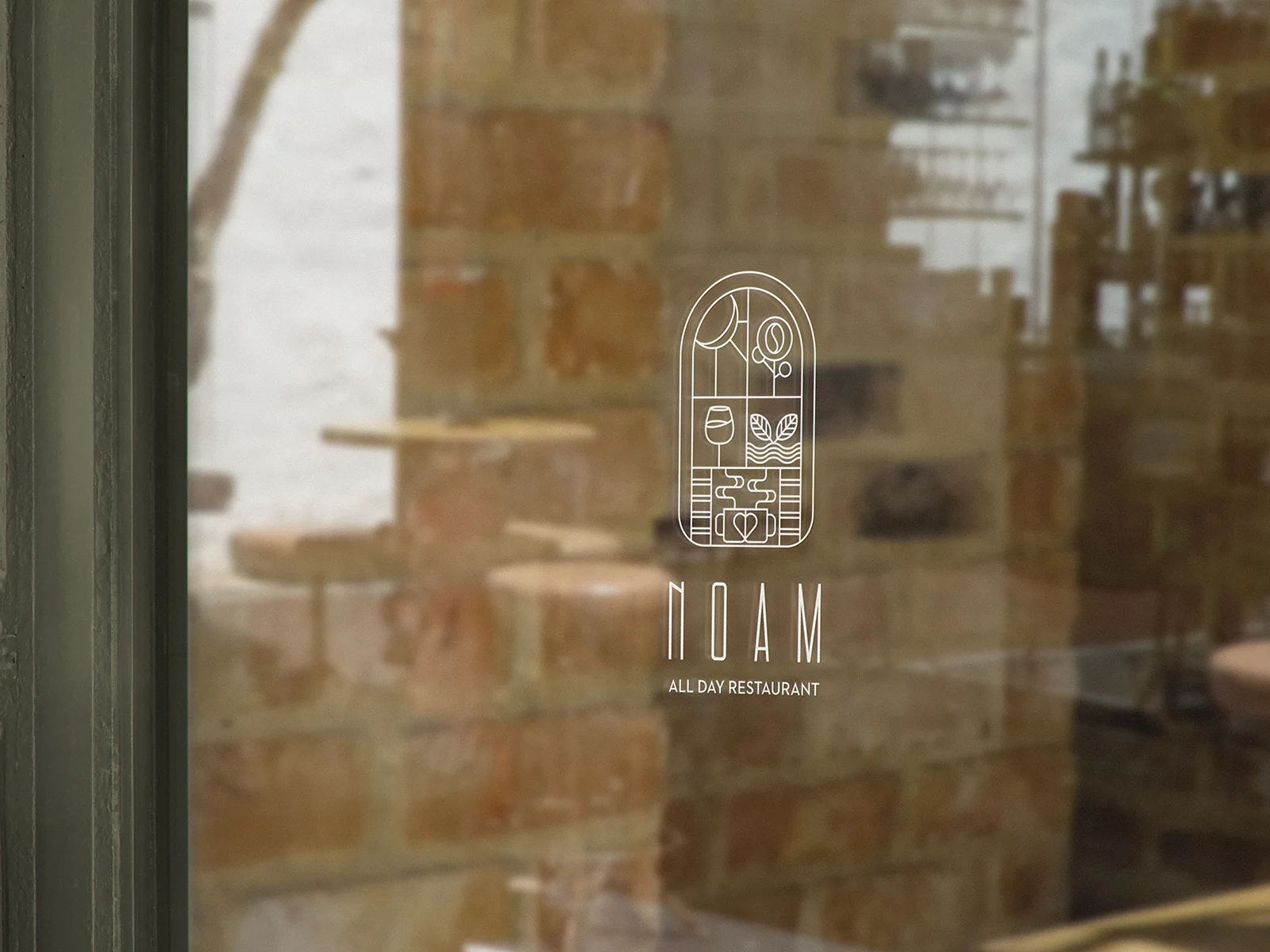 NOAM All Day Restaurant — window signage