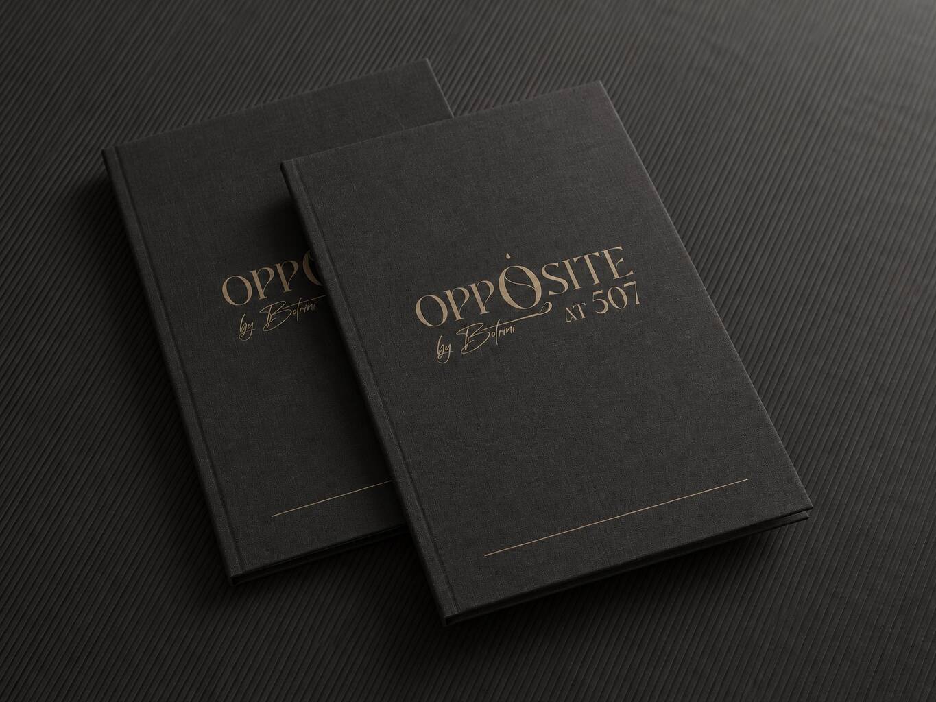 Charcoal restaurant menu cover mockups with the Opposite logo in muted gold foil