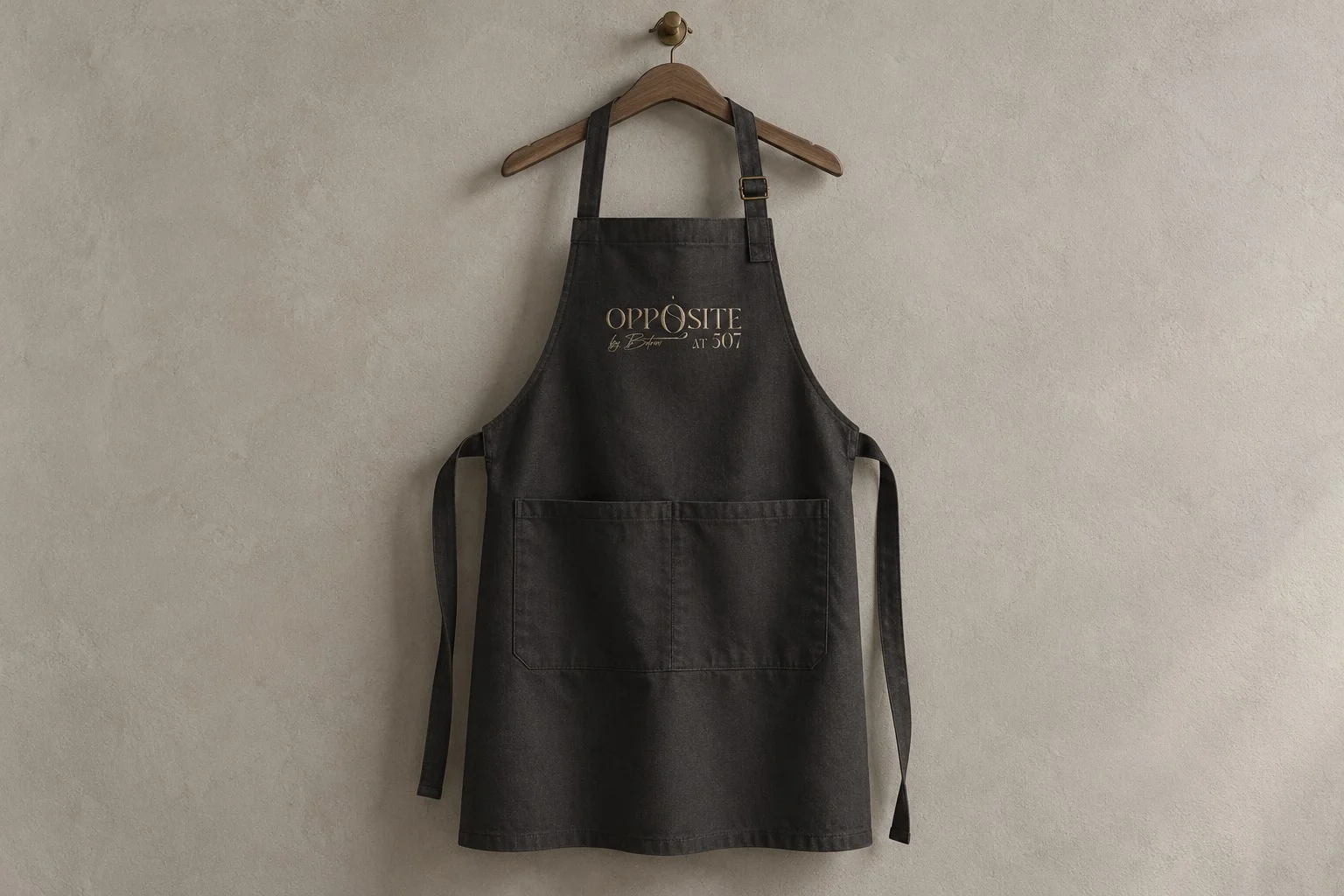 Apron mockup with the Opposite identity