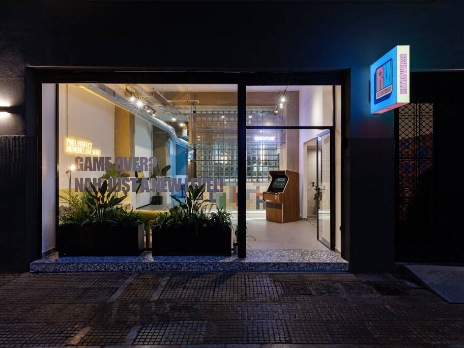 Retroverse exterior entrance signage and window graphics in central Athens