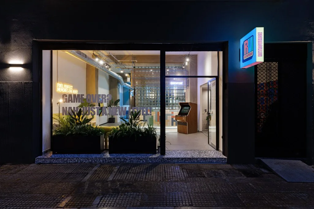 Retroverse exterior entrance signage and window graphics in central Athens