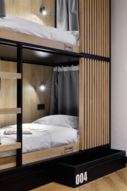 Bed and storage numbering designed for Retroverse Hostel