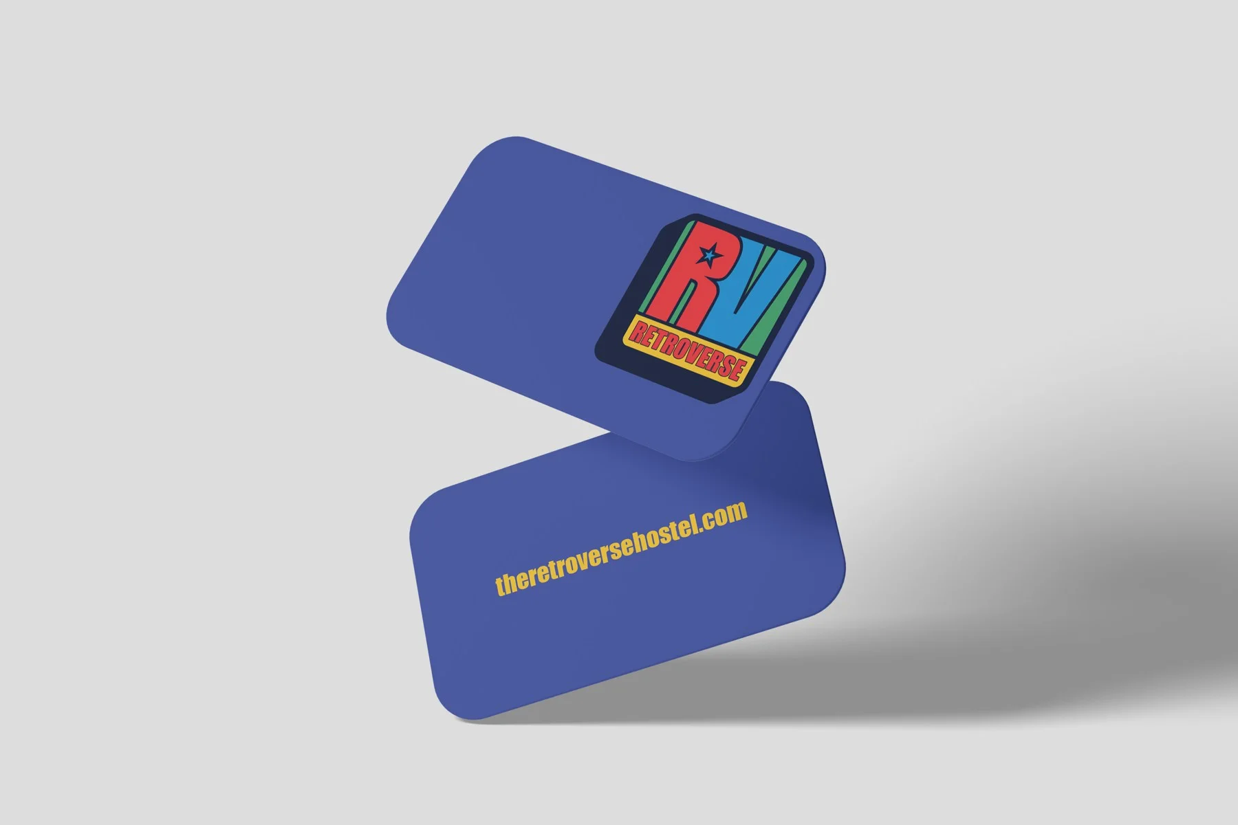 Retroverse business card concept in purple with the colourful RV logo