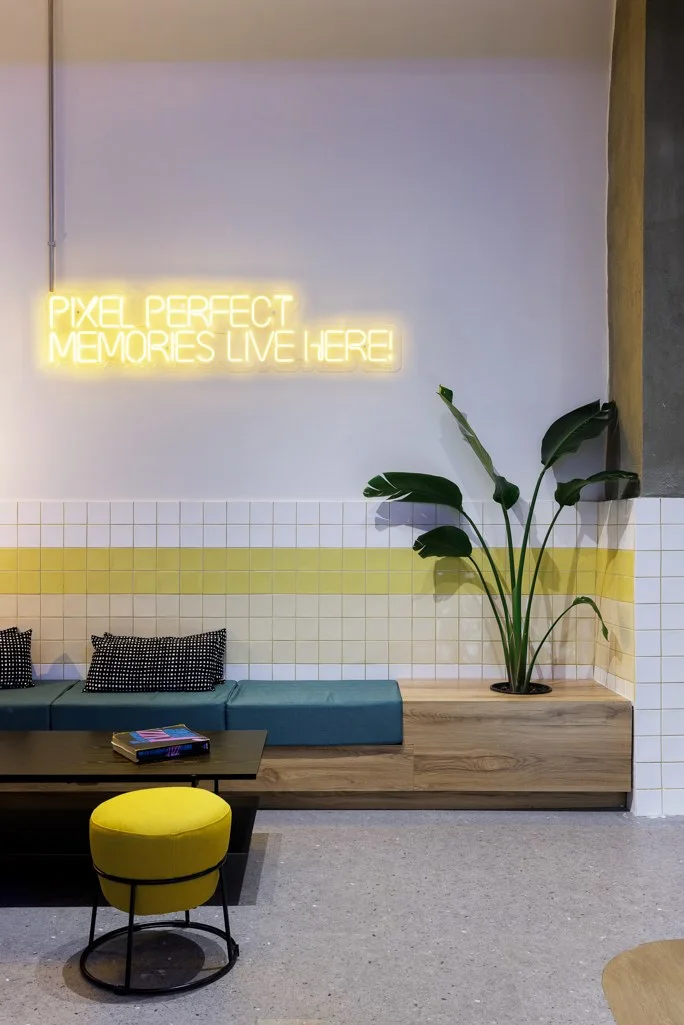 Pixel Perfect Memories Live Here neon in the Retroverse lounge