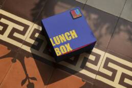 Purple meal box concept with Retroverse branding