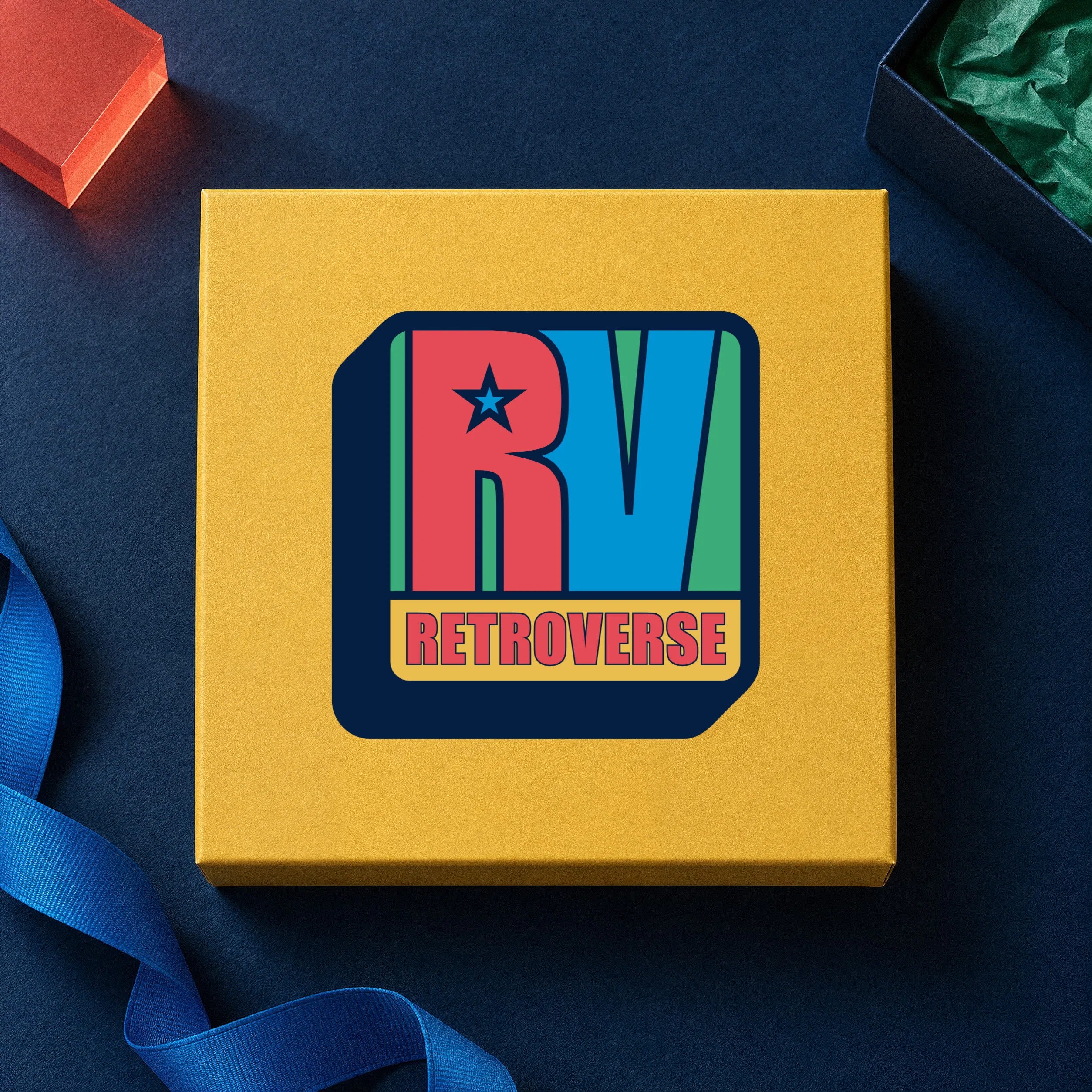 Yellow merchandise box with the original Retroverse RV logo on a navy surface