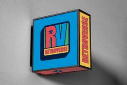 Retroverse exterior lightbox sign with the colourful RV logo and vertical Retroverse lettering