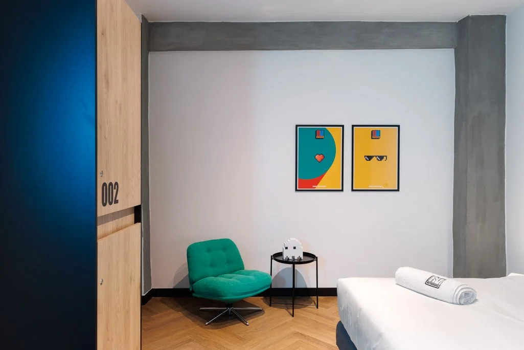 Retroverse graphic posters in a private guest room