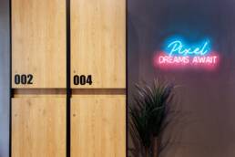 Numbered storage and Pixel Dreams Await neon at Retroverse